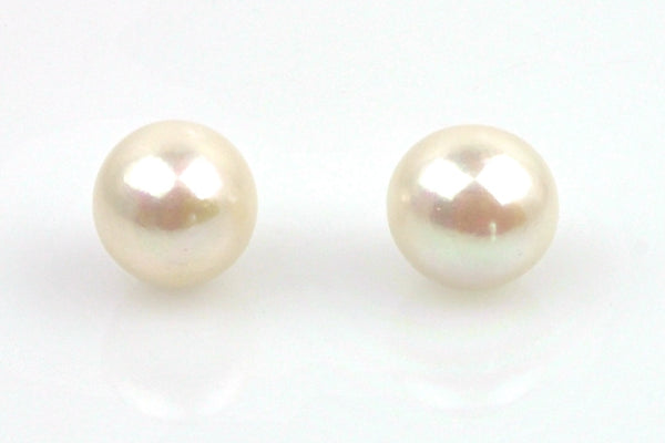 pair huge white button pearls