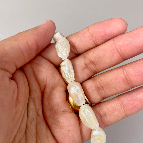 White feather pearl strand